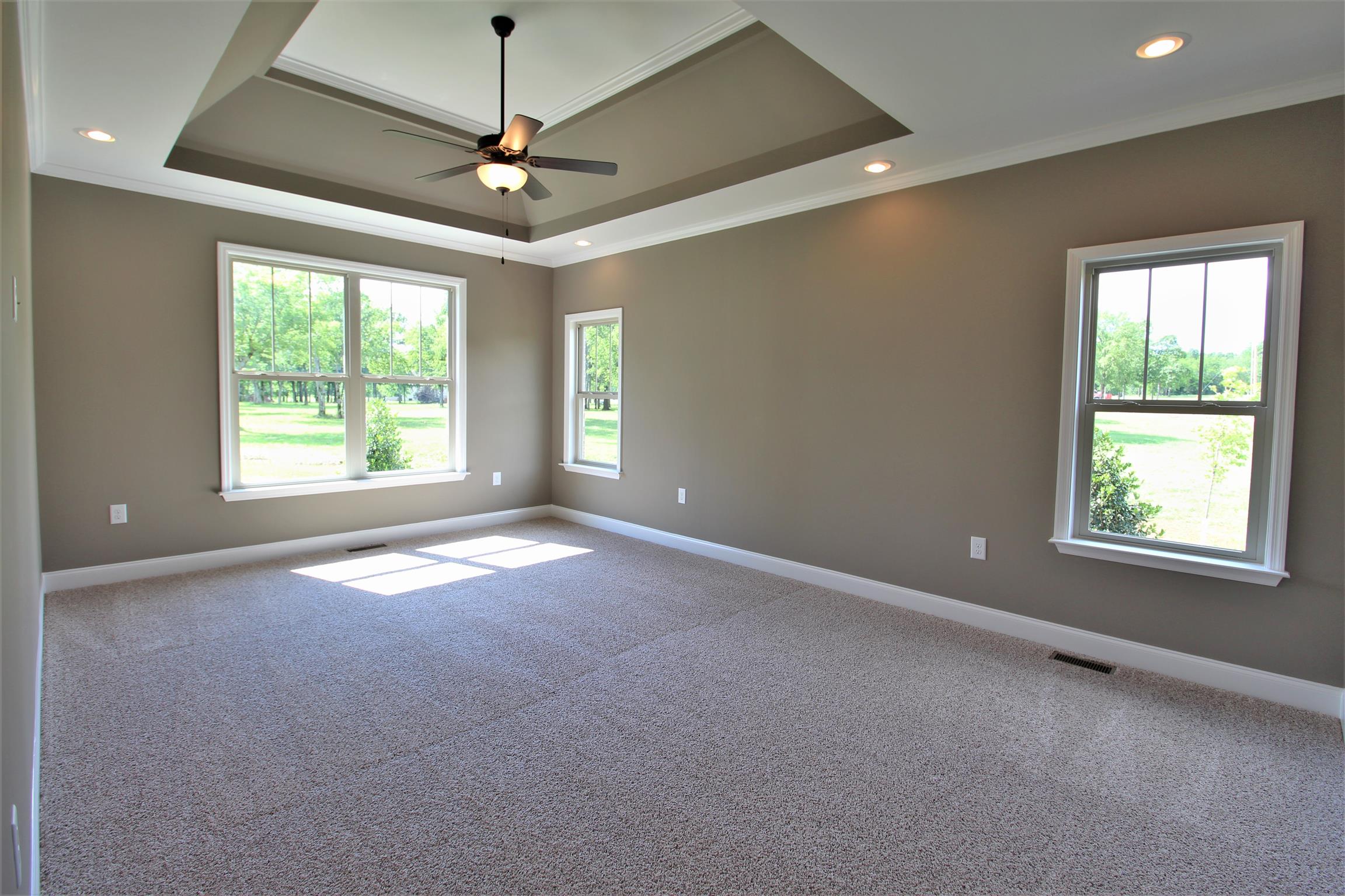 7150 Cedar Forest Road Lebanon, TN 37090 - Photo 12 of 29 a view of a livingroom with a ceiling fan and window