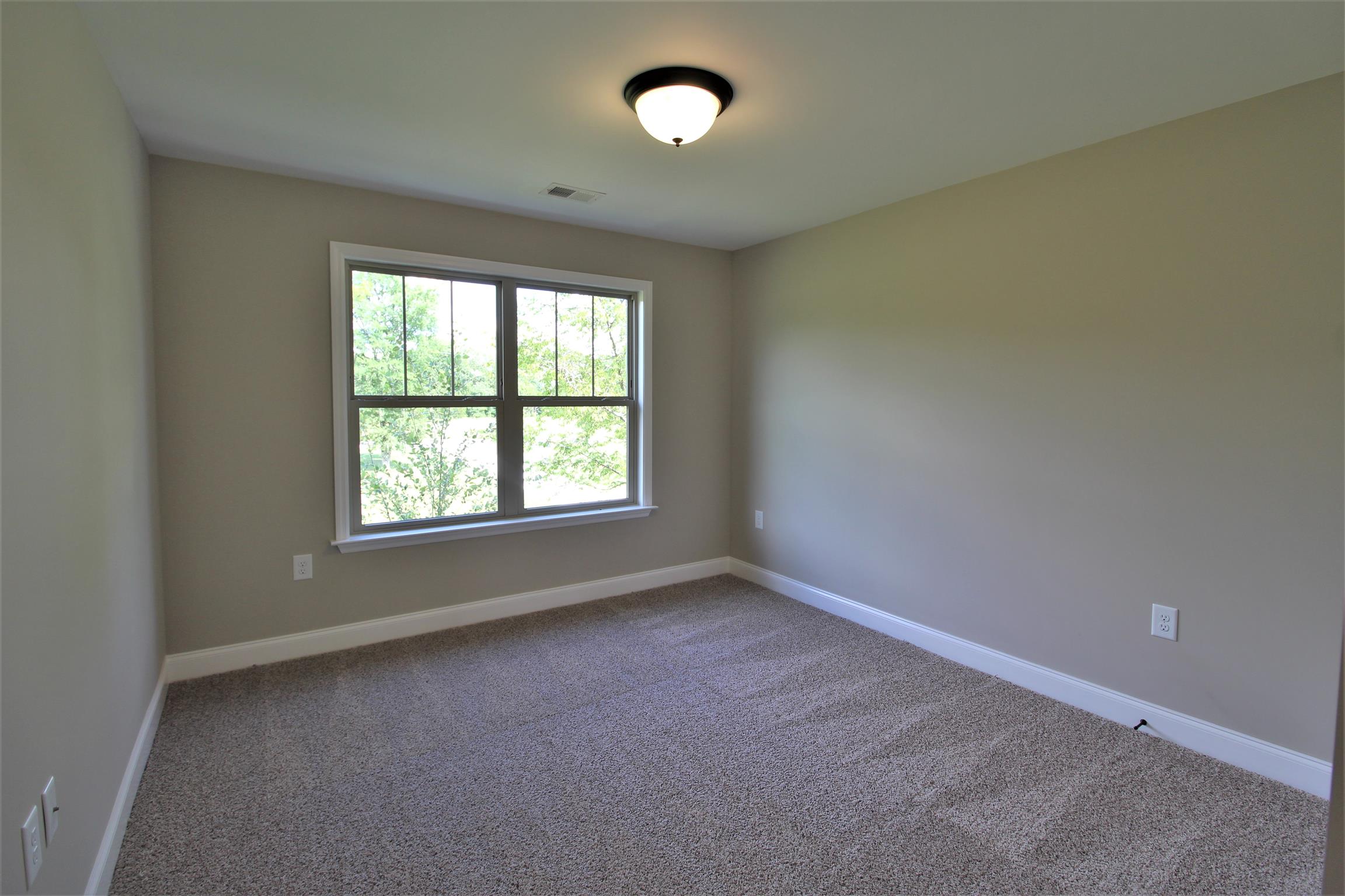 7150 Cedar Forest Road Lebanon, TN 37090 - Photo 18 of 29 an empty room with a window