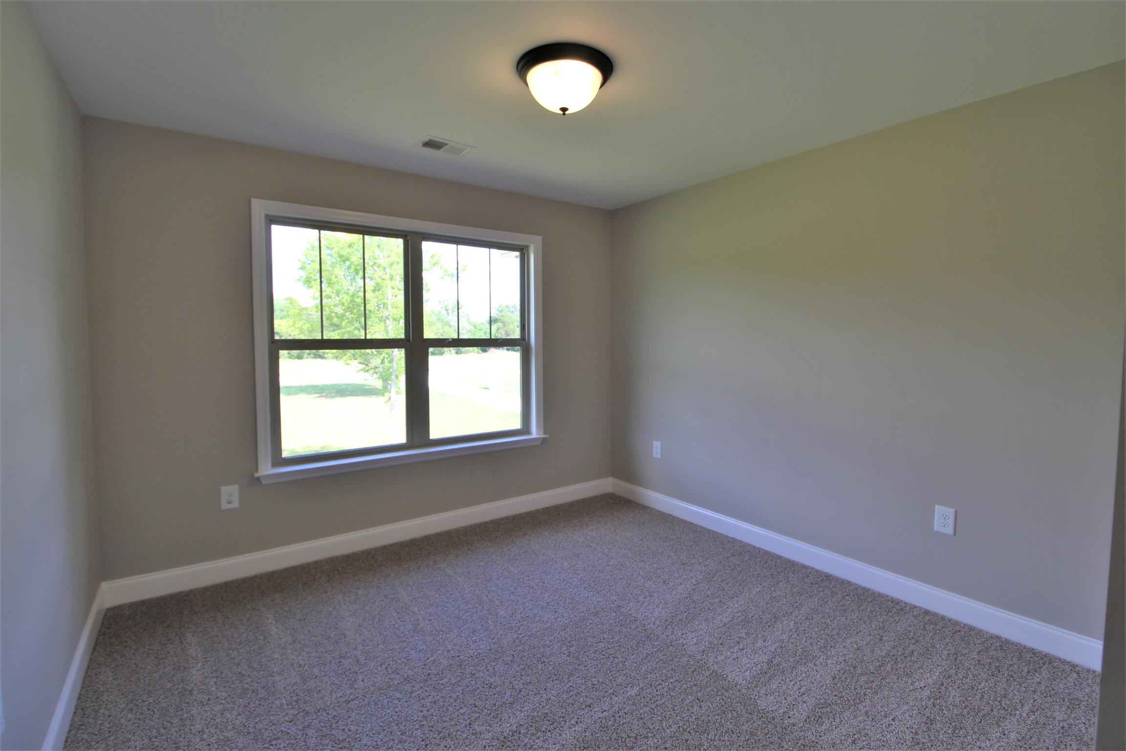 7150 Cedar Forest Road Lebanon, TN 37090 - Photo 24 of 29 an empty room with a window