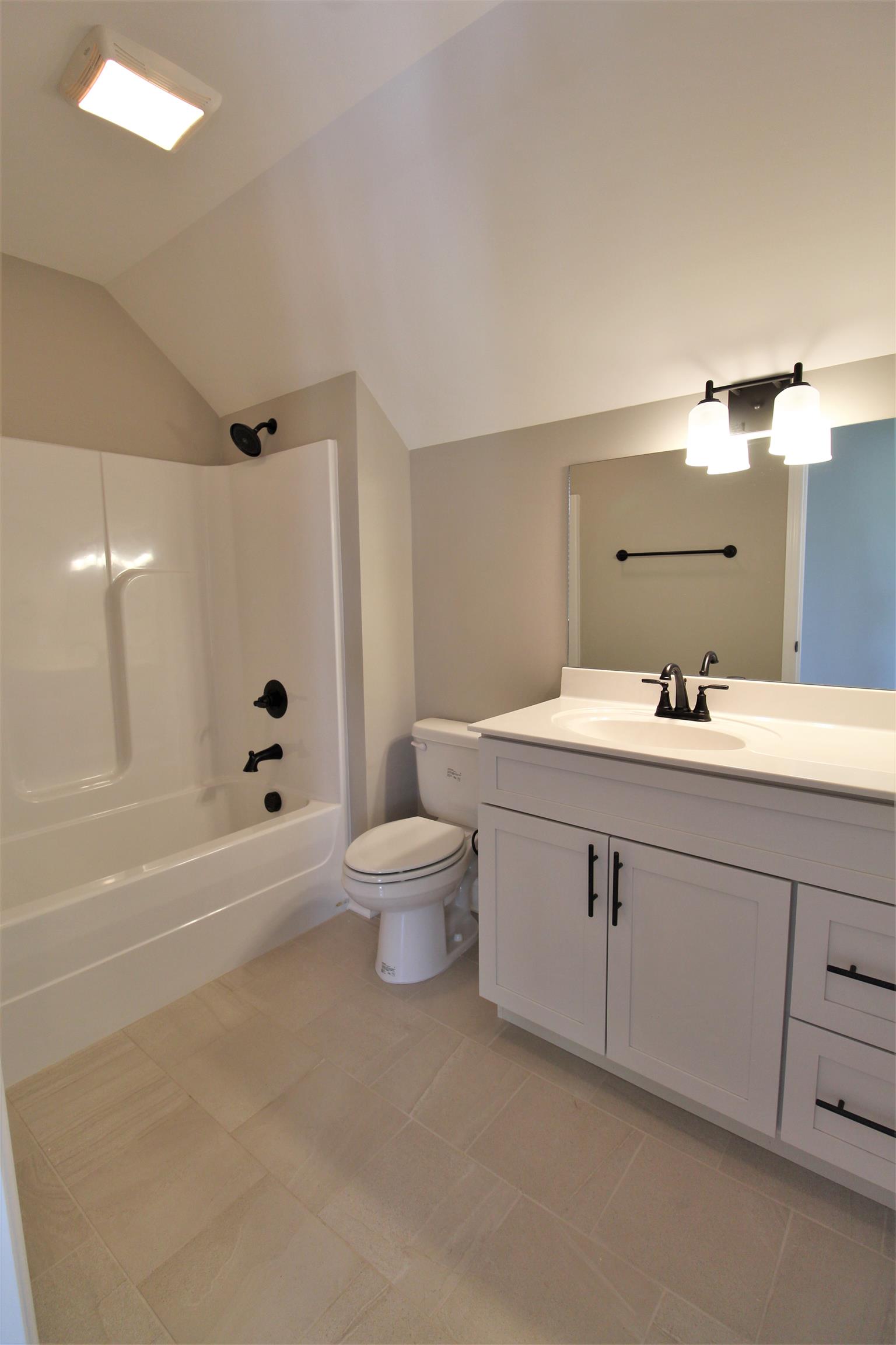 7150 Cedar Forest Road Lebanon, TN 37090 - Photo 25 of 29 a bathroom with a sink a toilet and shower