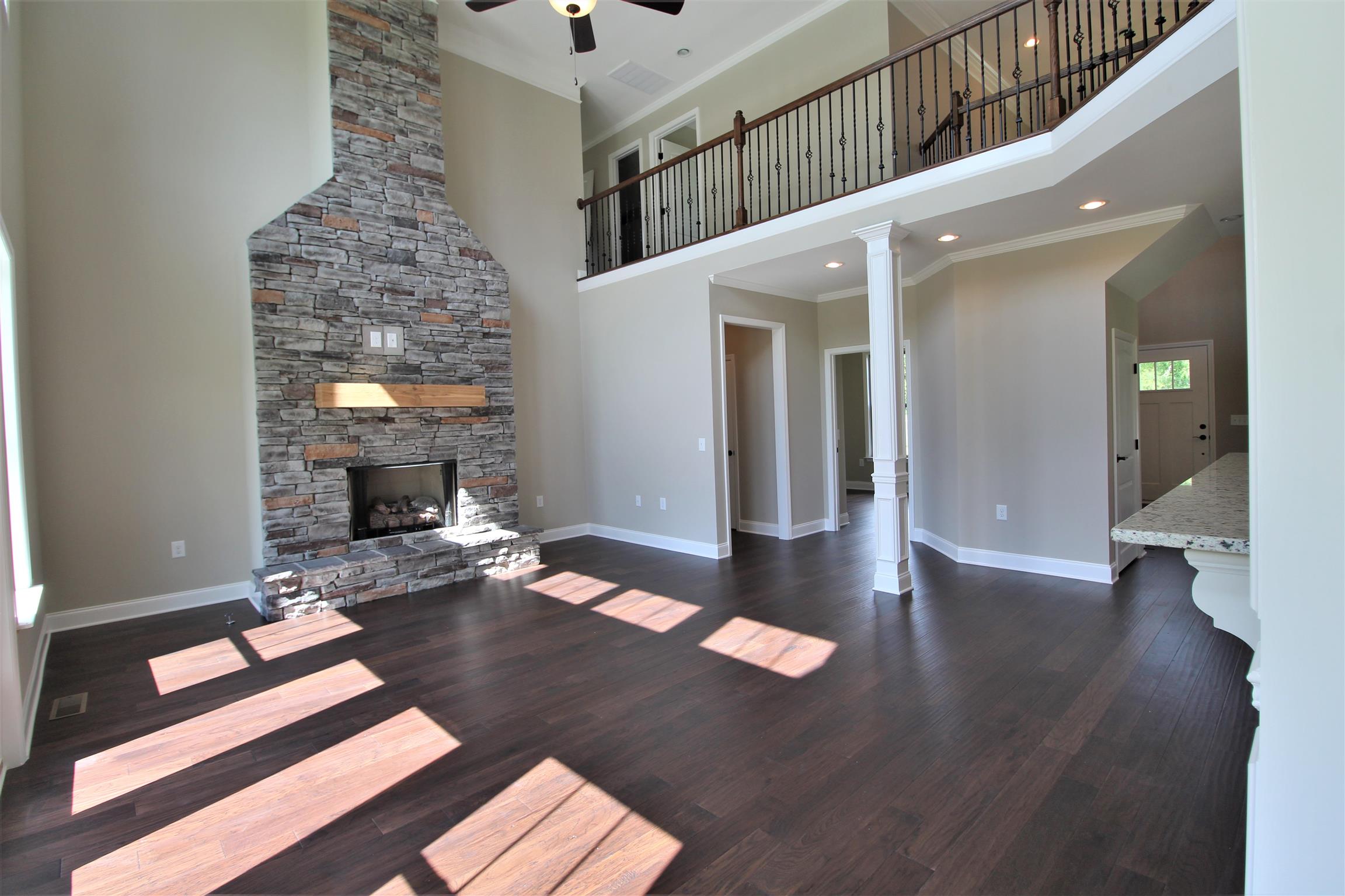 7150 Cedar Forest Road Lebanon, TN 37090 - Photo 4 of 29 a living room with furniture and a fireplace