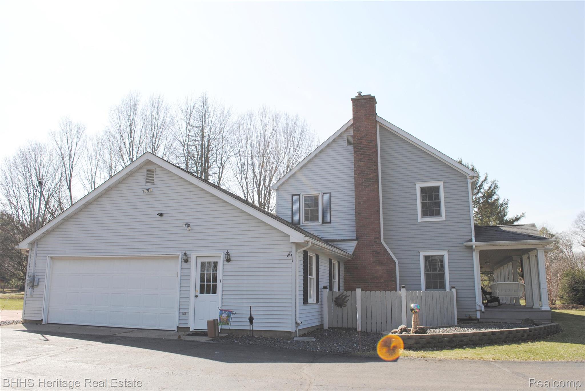 4450 Golf Club Road Howell, MI 48843 - Photo 10 of 59 Side view of the home