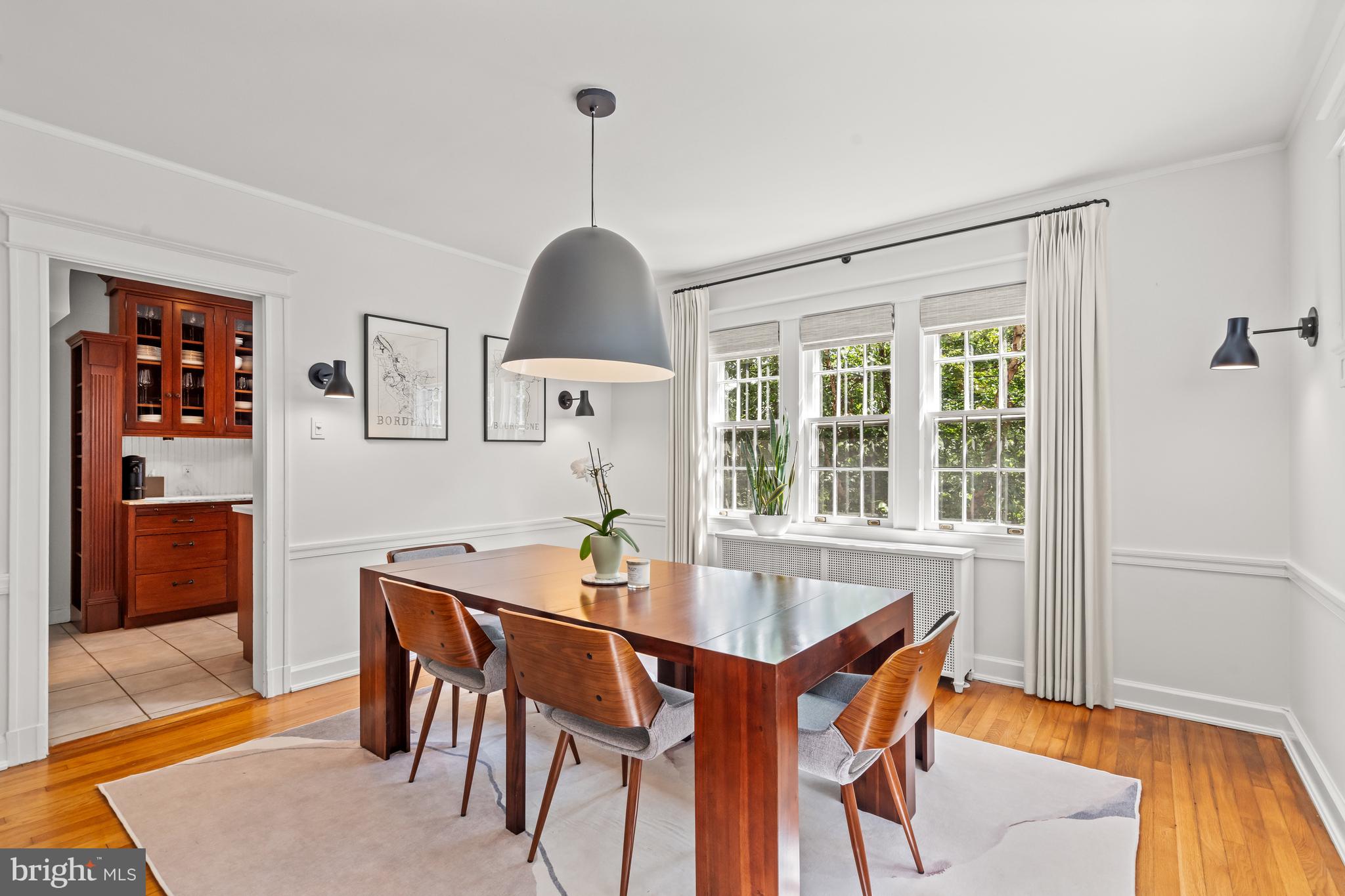 4452 Q Street Northwest Washington, DC 20007 - Photo 4 of 20 a view of a dining room with furniture window and wooden floor