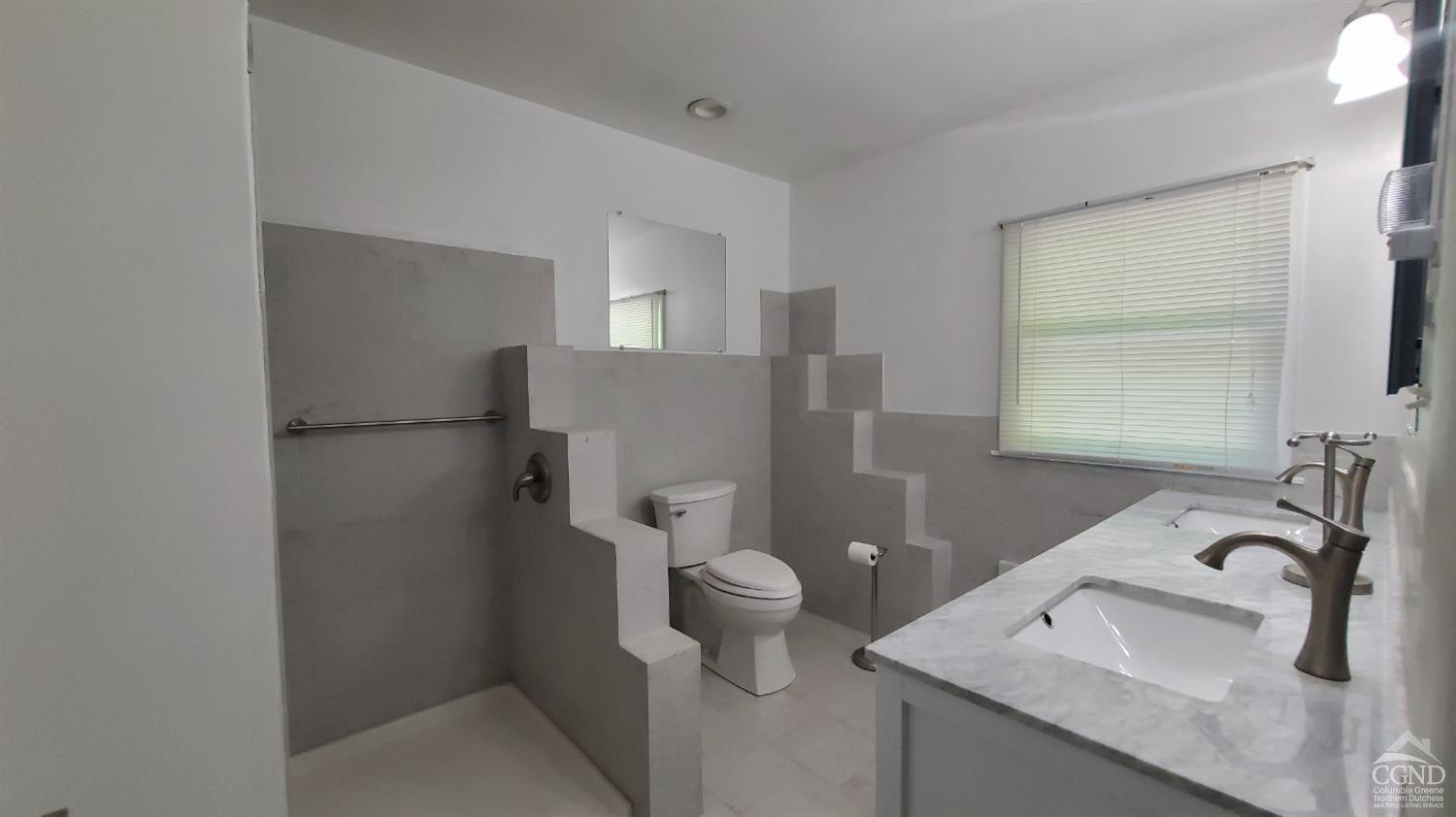 492 Cairo Junction Road Catskill, NY 12414 - Photo 12 of 34 a bathroom with a sink toilet and shower