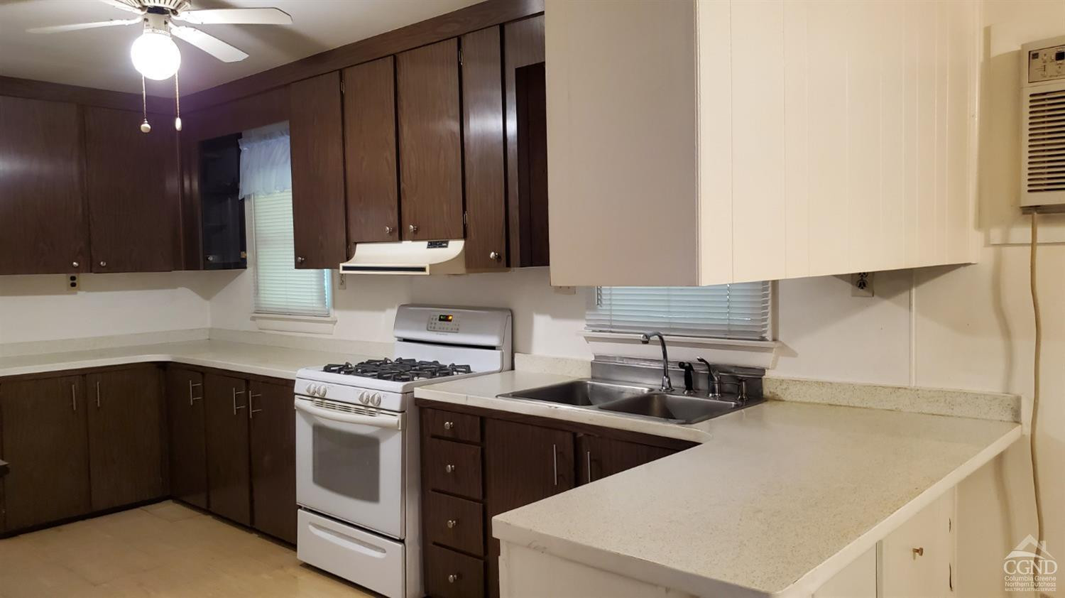 492 Cairo Junction Road Catskill, NY 12414 - Photo 7 of 34 a kitchen that has a sink and a stove