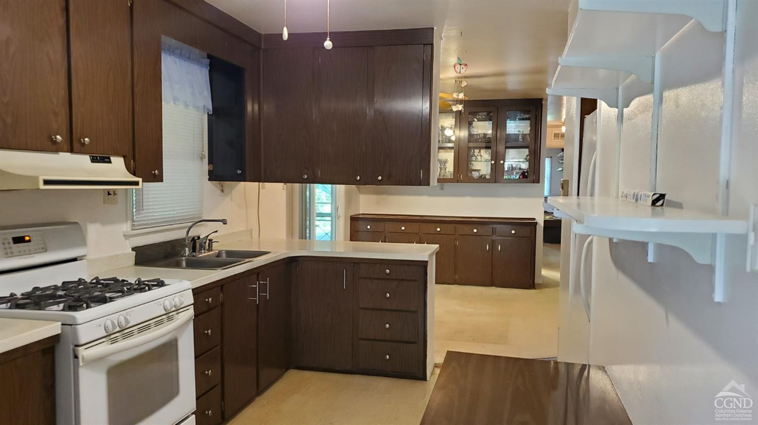 492 Cairo Junction Road Catskill, NY 12414 - Photo 8 of 34 a kitchen with a sink stove and refrigerator