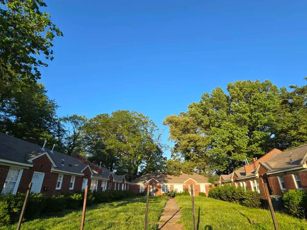 a view of a house with a big yard
