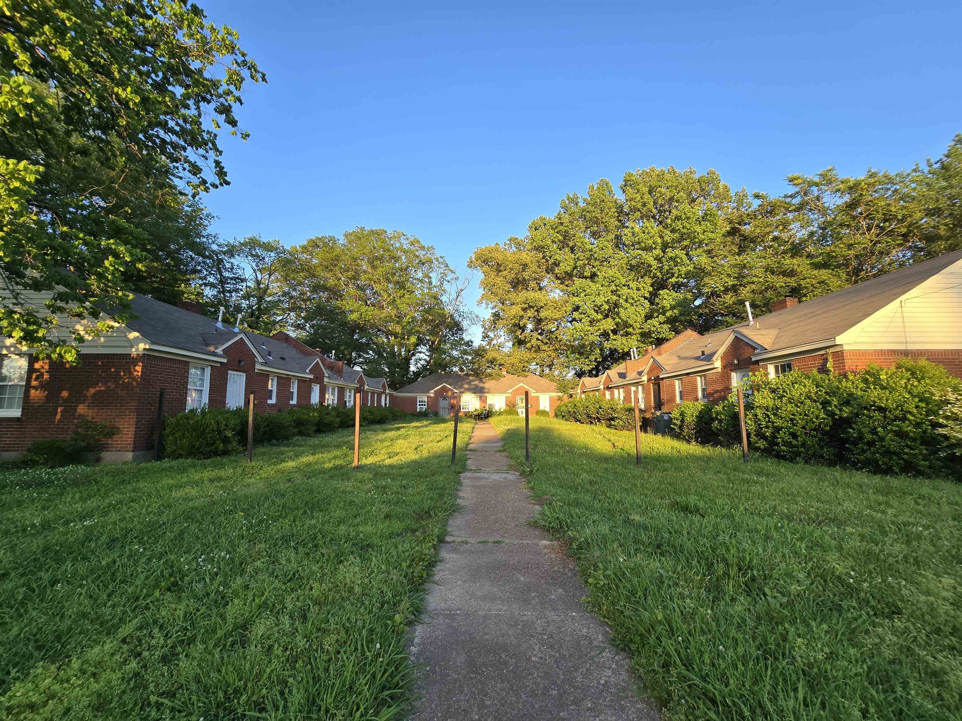 1572 Hanauer Street Memphis, TN 38109 - Photo 24 of 39 a front view of a house with a yard