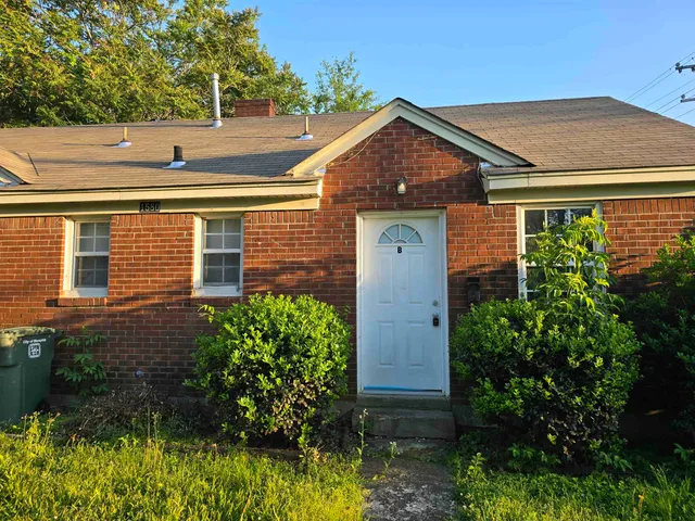 a view of a road with a sign board
