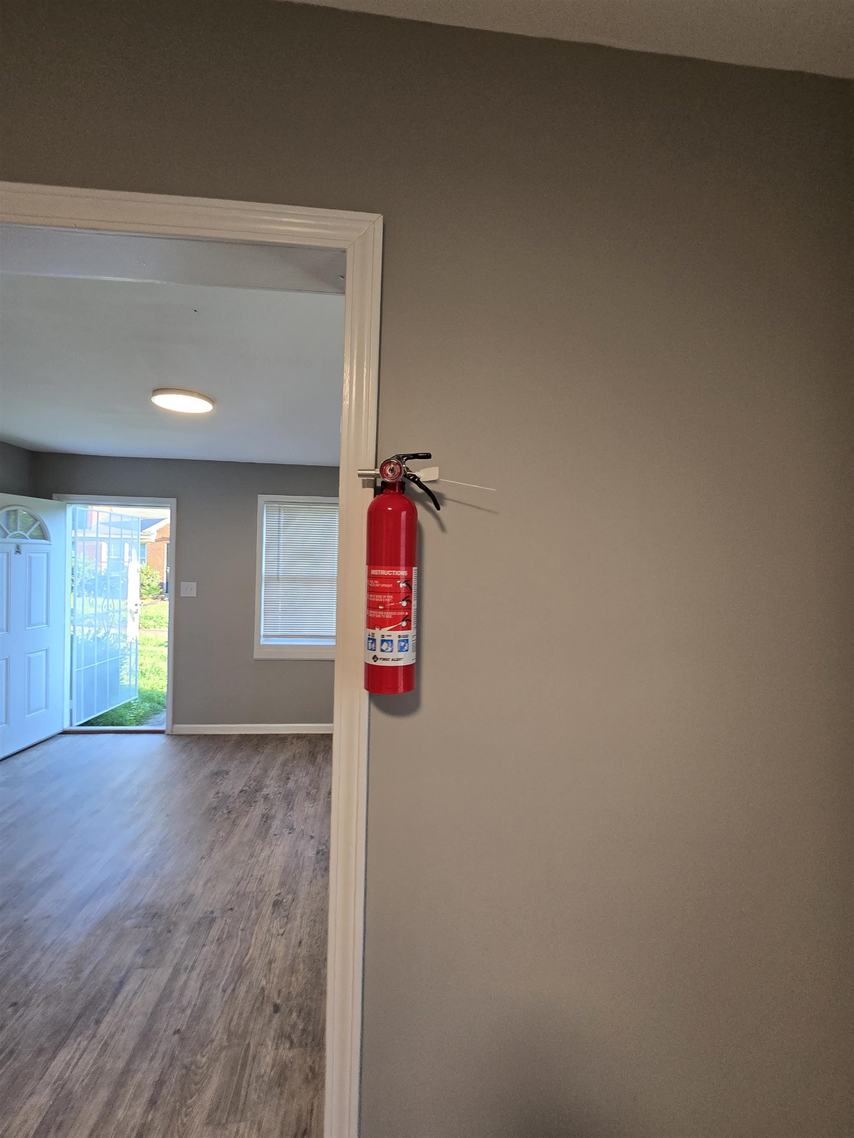 1572 Hanauer Street Memphis, TN 38109 - Photo 34 of 39 Corridor with wood finished floors and baseboards
