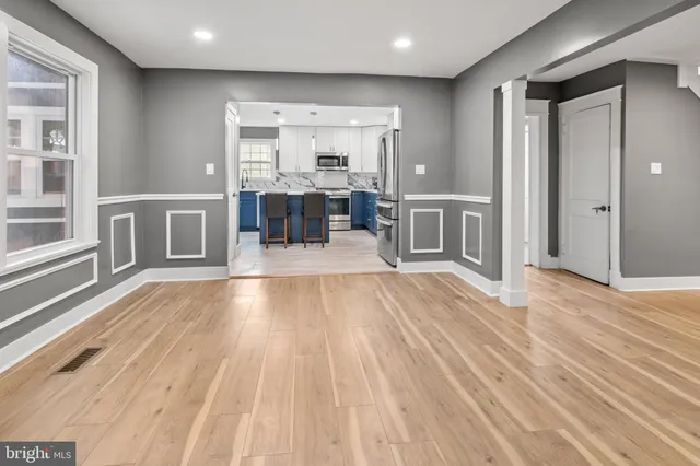 a bedroom with furniture and a fireplace