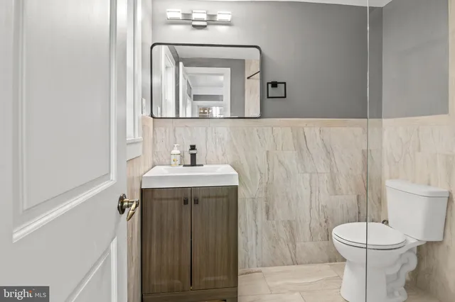 a view of a entryway with wooden floor