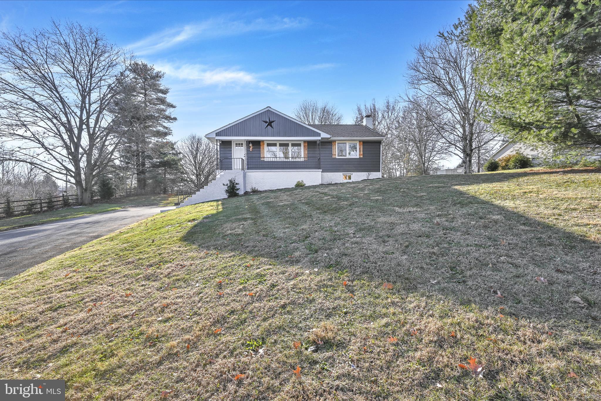 4 Truce Road New Providence, PA 17560 - Photo 30 of 34 a front view of a house with a yard