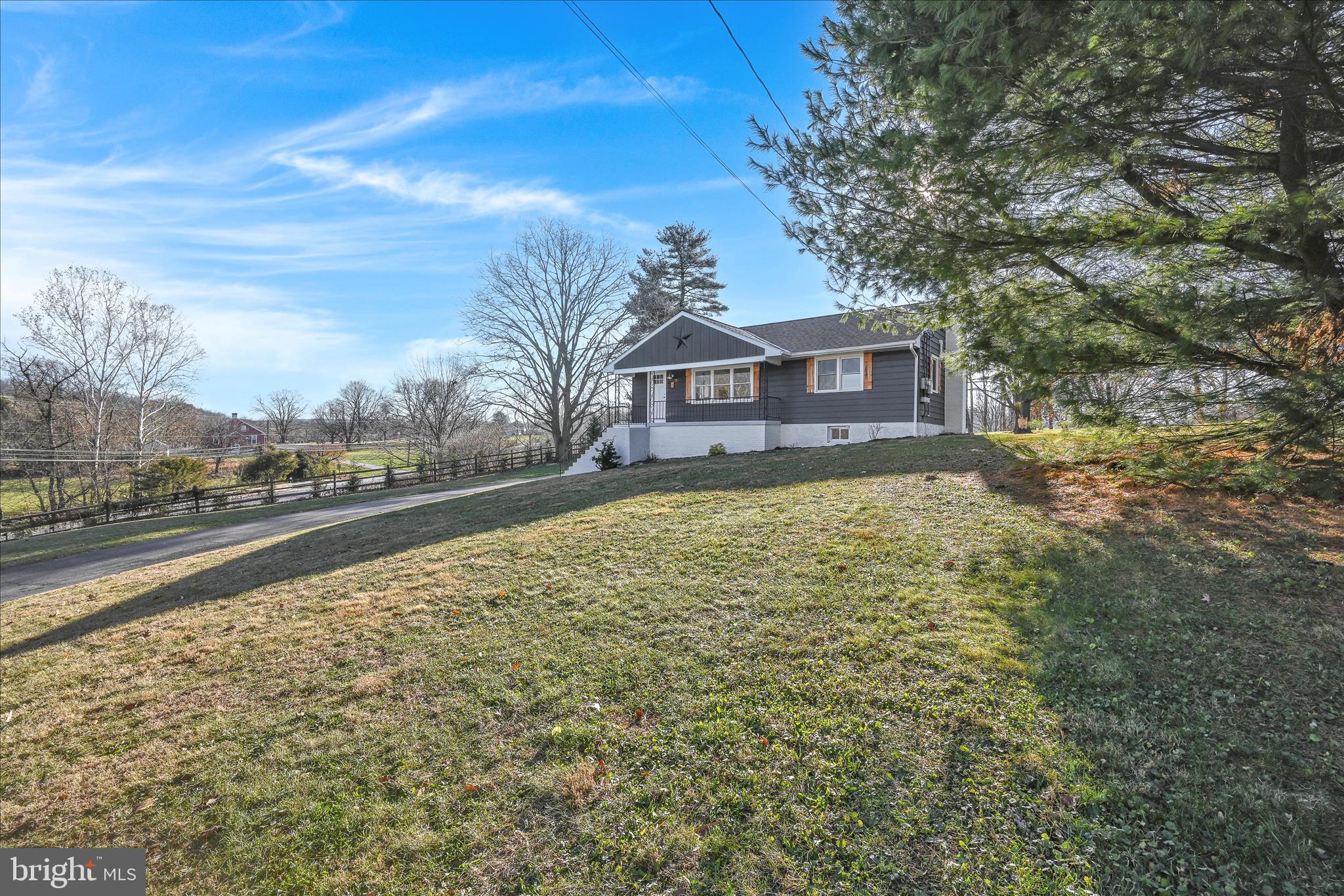 4 Truce Road New Providence, PA 17560 - Photo 31 of 34 a view of a large house with a big yard and large tree