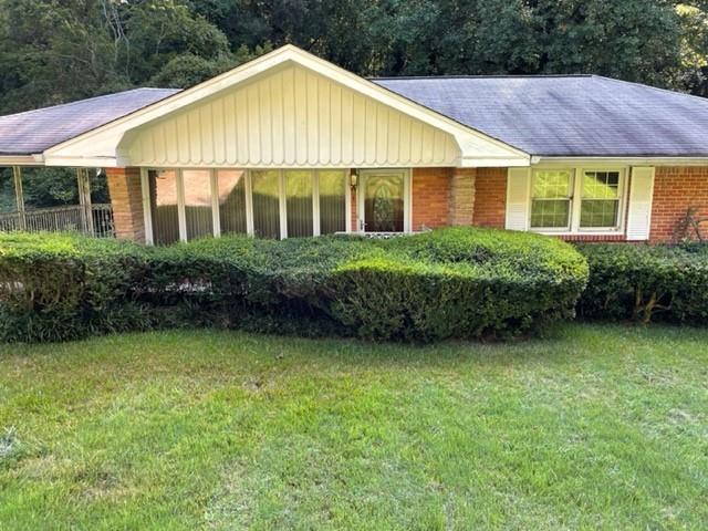 2070 Highview Road Southwest Atlanta, GA 30311 - Photo 1 of 1 a view of a house with garden and yard