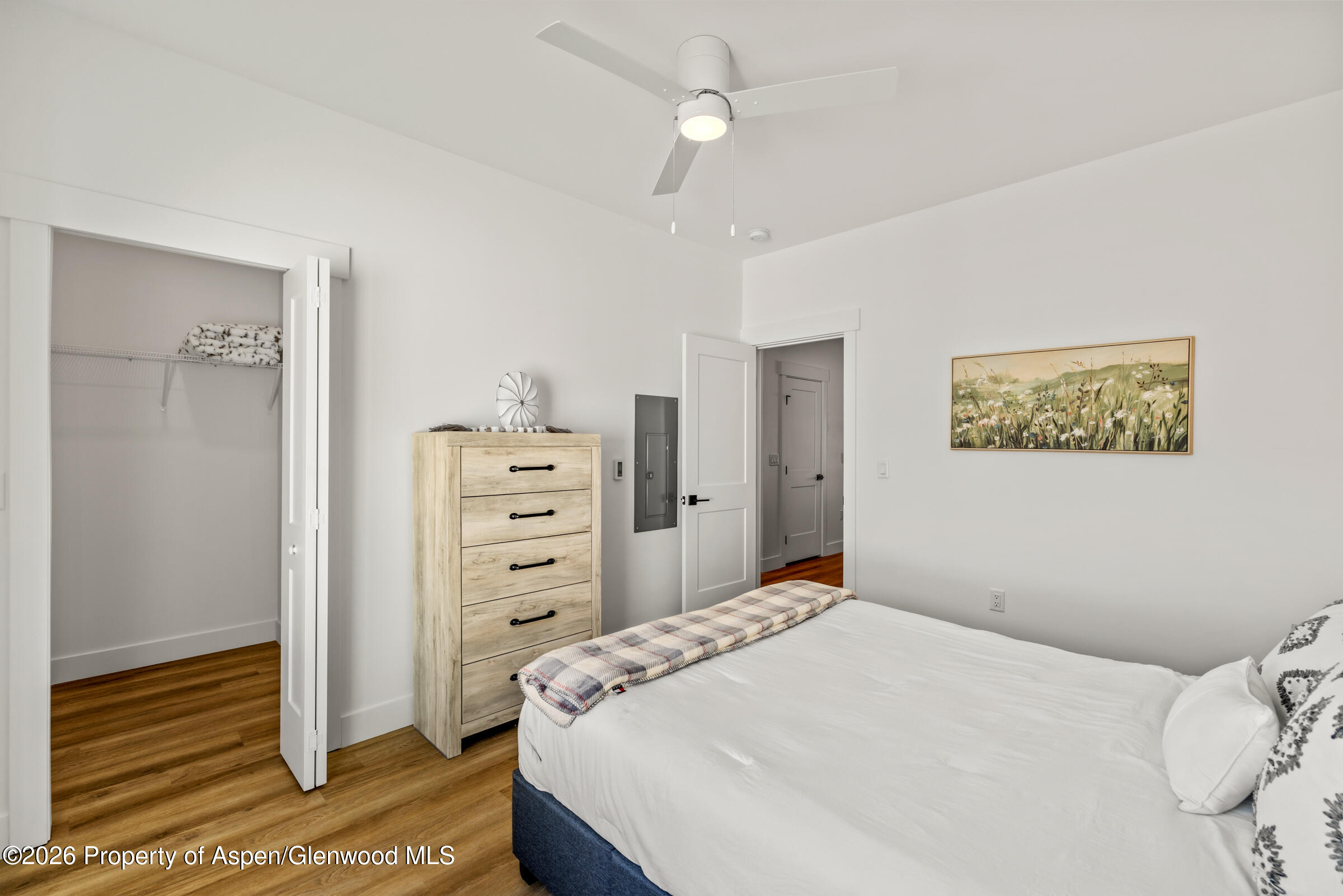 774 Tucker Street Craig, CO 81625 - Photo 12 of 23 a bedroom with a bed and a cabinets