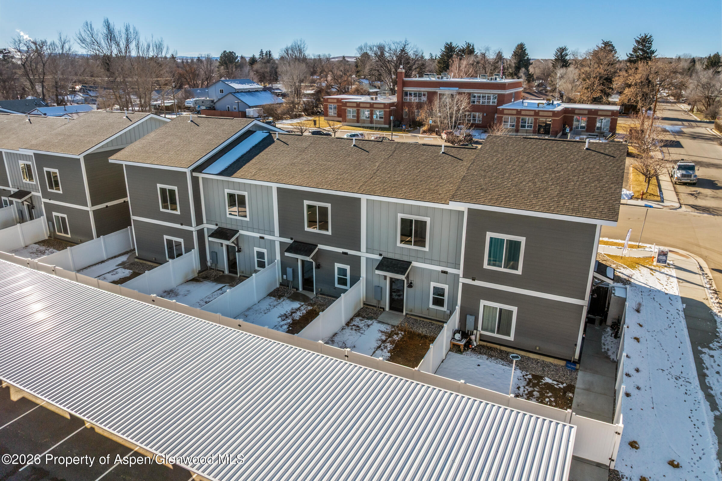 774 Tucker Street Craig, CO 81625 - Photo 4 of 23 an aerial view of a house with wooden fence