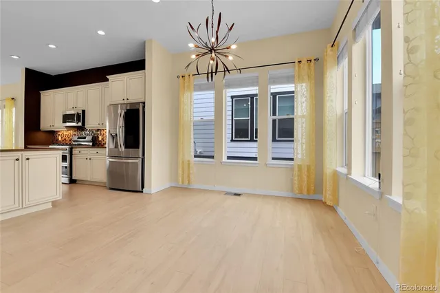 a view of a kitchen with a sink