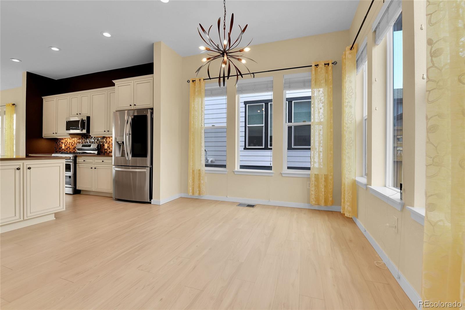5154 Taft Court Wheat Ridge, CO 80033 - Photo 14 of 44 a view of a kitchen with a sink