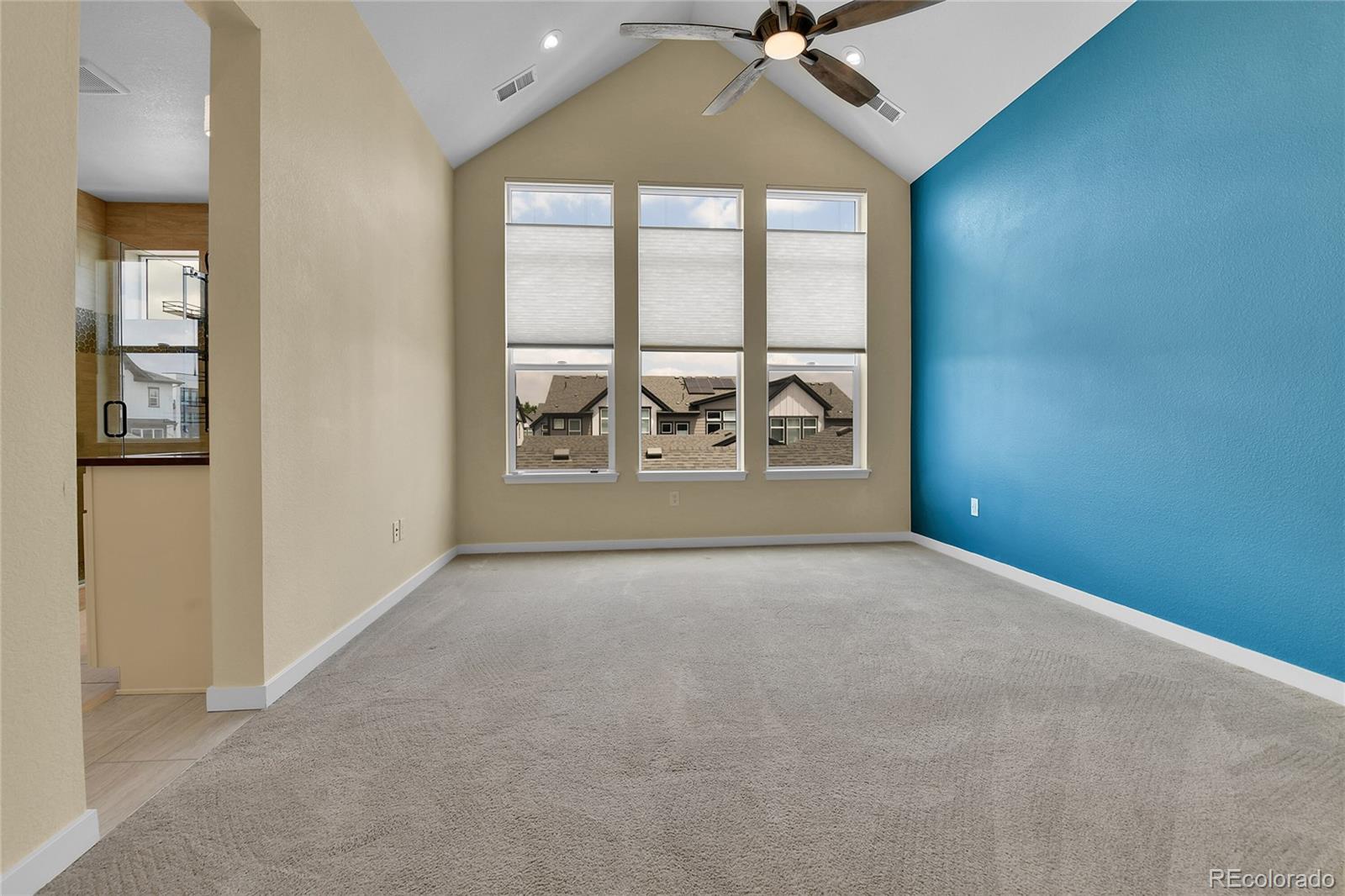 5154 Taft Court Wheat Ridge, CO 80033 - Photo 18 of 44 an empty room with a fan