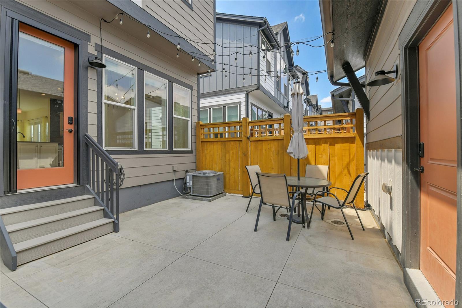 5154 Taft Court Wheat Ridge, CO 80033 - Photo 2 of 44 a view of a patio with table and chairs