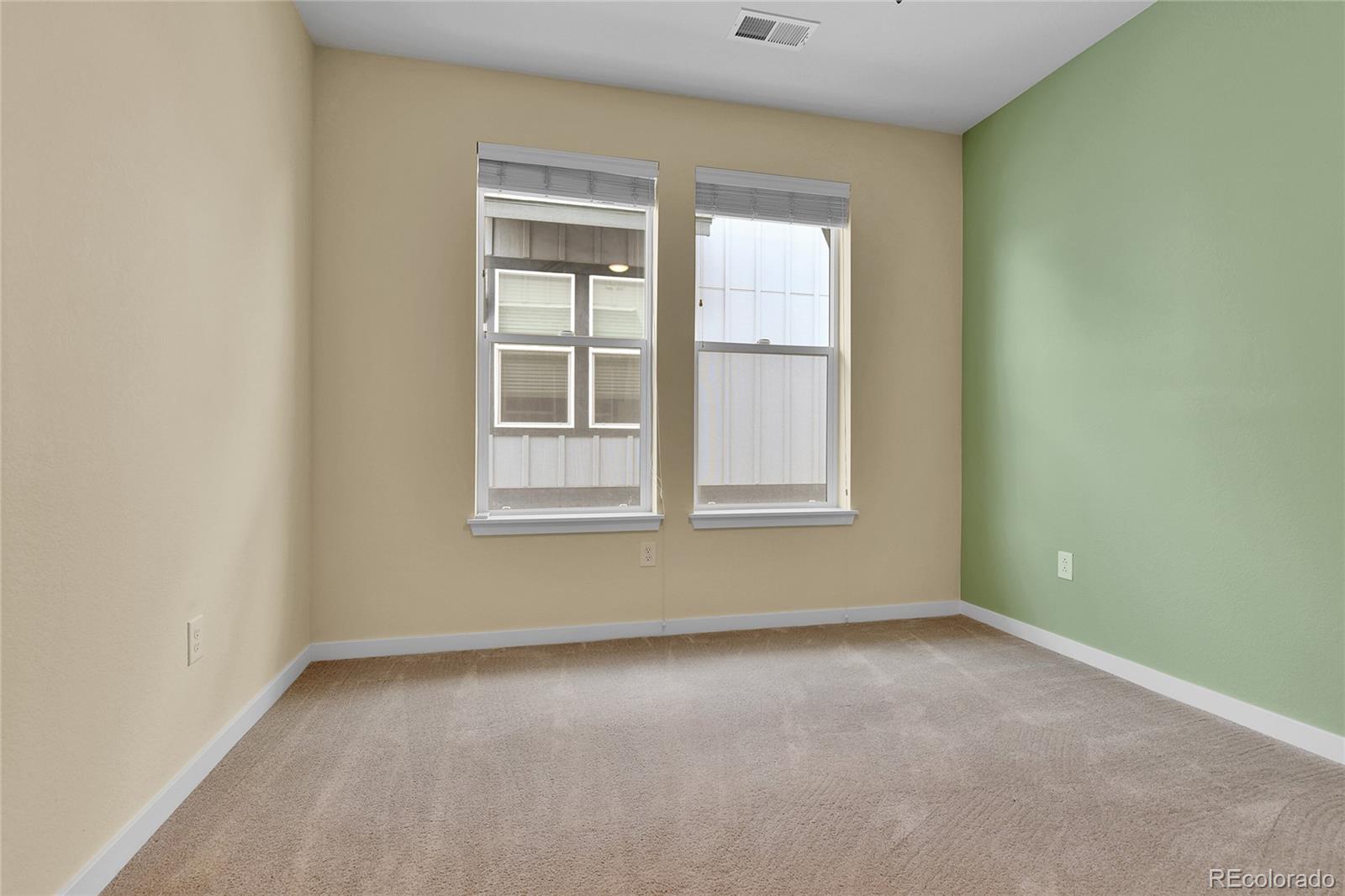 5154 Taft Court Wheat Ridge, CO 80033 - Photo 25 of 44 an empty room with a window