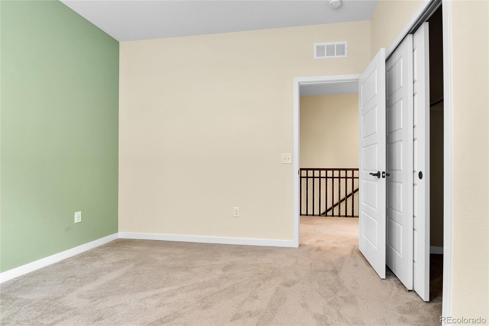 5154 Taft Court Wheat Ridge, CO 80033 - Photo 26 of 44 a view of a hallway with a window