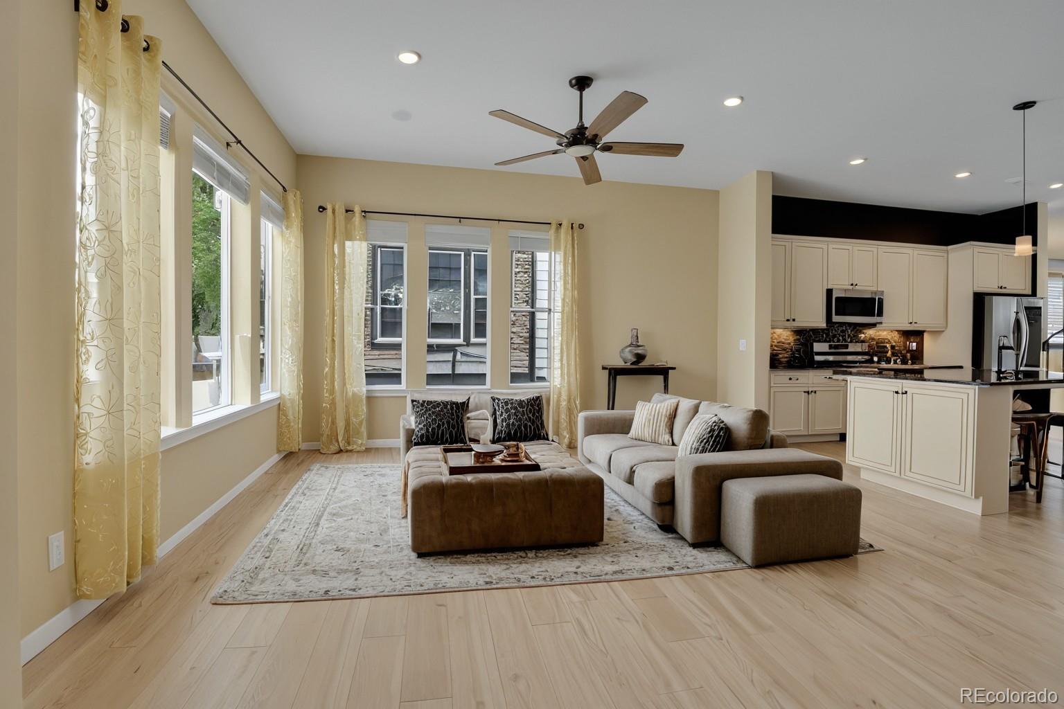 5154 Taft Court Wheat Ridge, CO 80033 - Photo 3 of 44 a living room with furniture and a large window