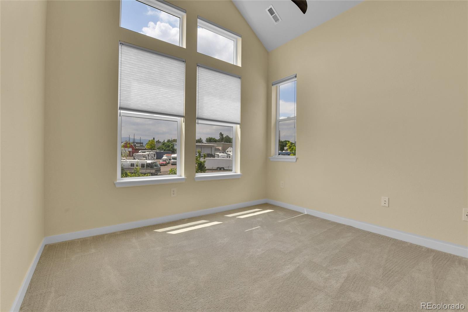 5154 Taft Court Wheat Ridge, CO 80033 - Photo 31 of 44 an empty room with windows