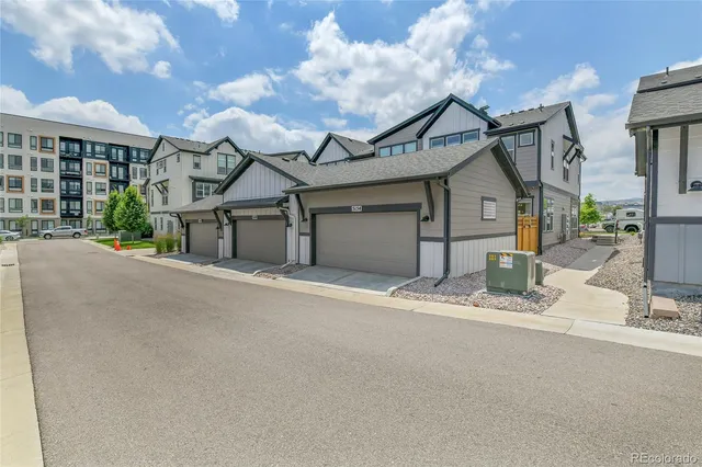 front view of a house with a street