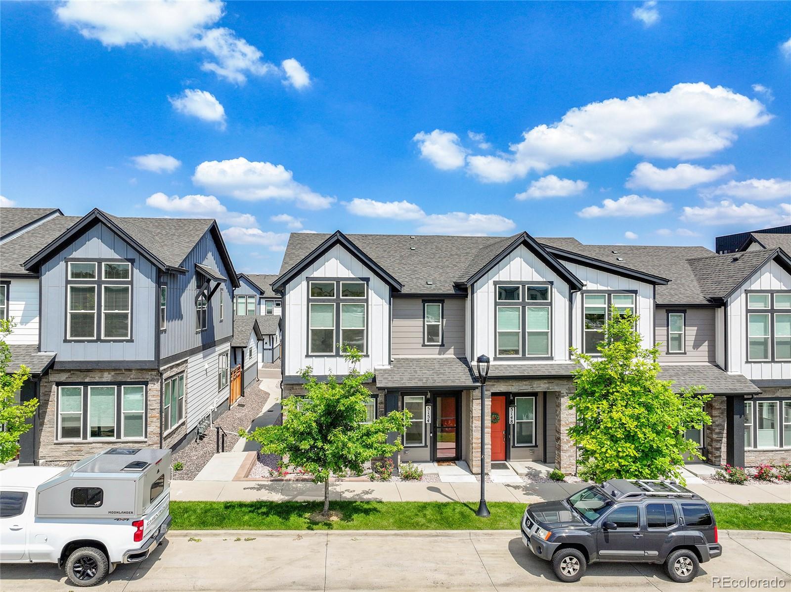 5154 Taft Court Wheat Ridge, CO 80033 - Photo 41 of 44 a front view of a house with a garden and plants