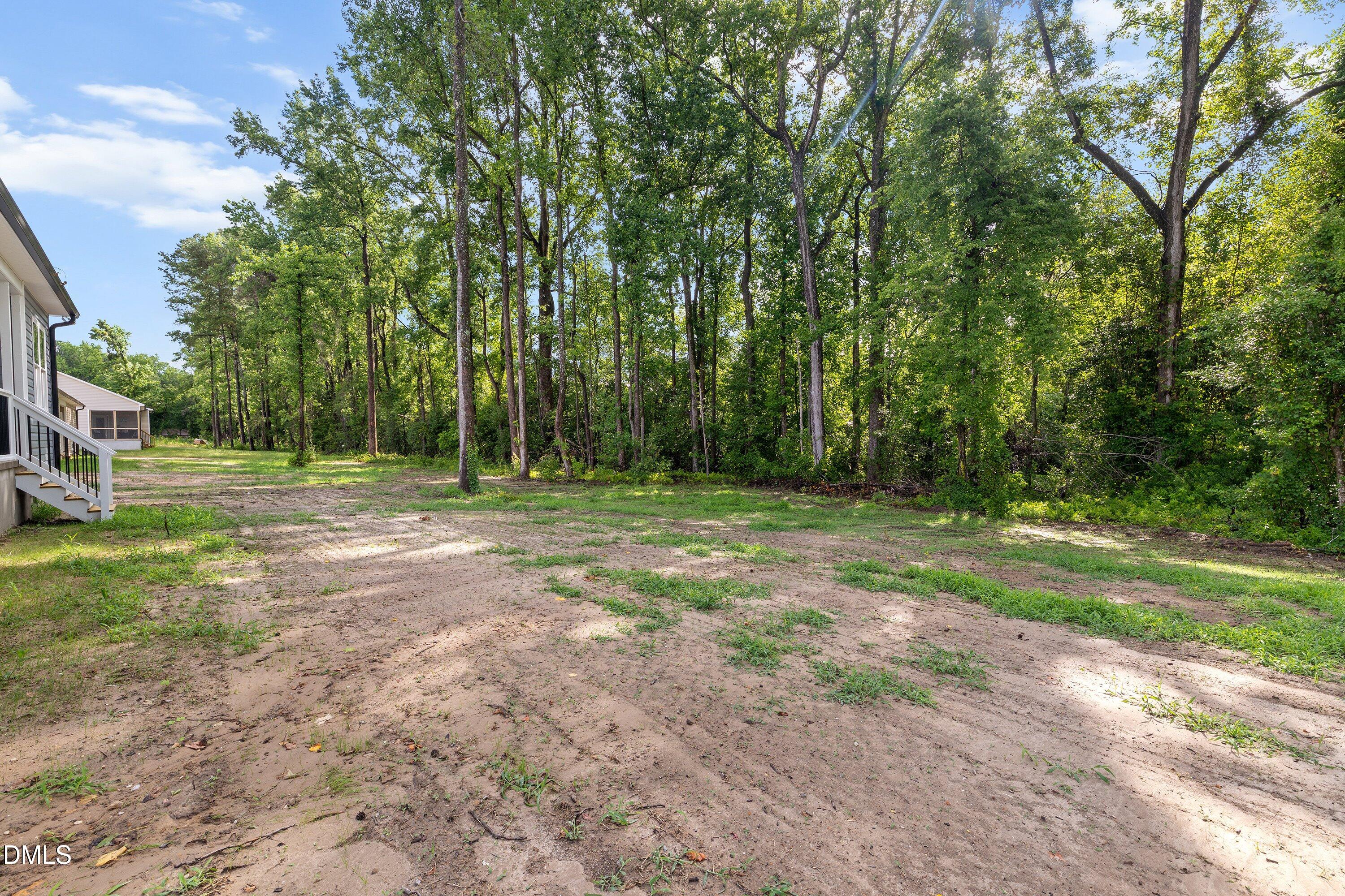 1115 Nor-Am Road Pikeville, NC 27863 - Photo 39 of 40 a view of outdoor space with trees all around