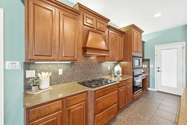 a view of a dining room with furniture wooden floor and chandelier