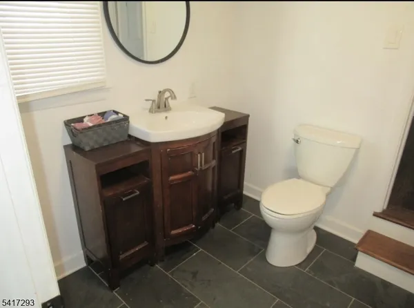 a bathroom with a sink and a toilet