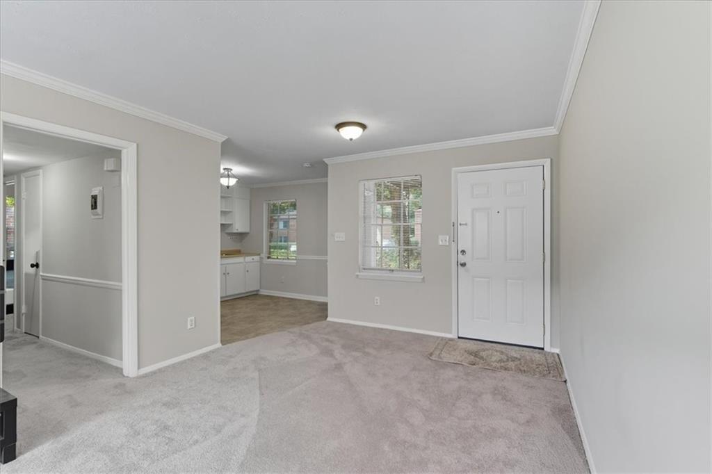 2427 Lawrenceville Highway, Unit 4B Decatur, GA 30033 - Photo 10 of 22 a view of an empty room with a window
