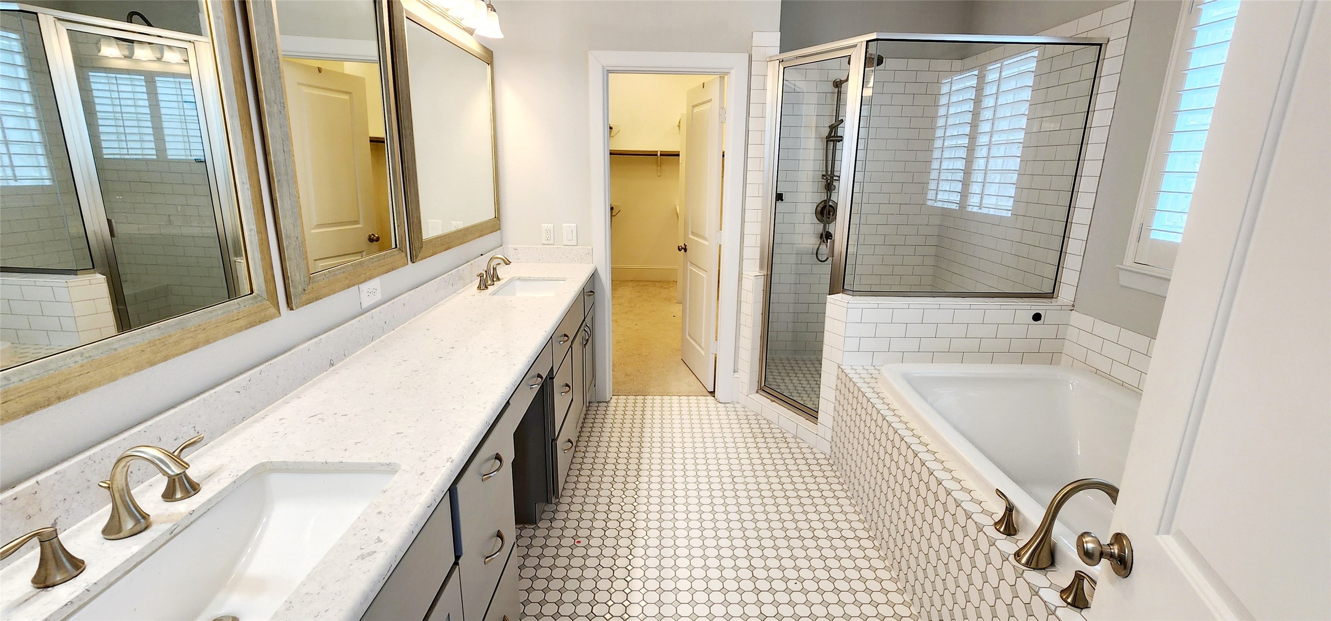 11 West Rafters Row The Woodlands, TX 77380 - Photo 28 of 31 a bathroom with a tub a sink and a shower