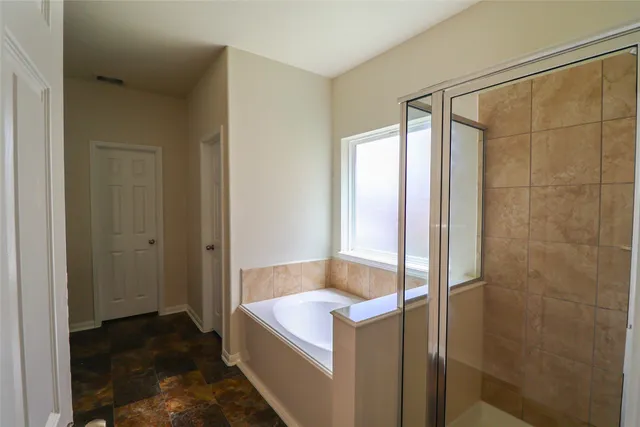 a kitchen with a sink and a refrigerator
