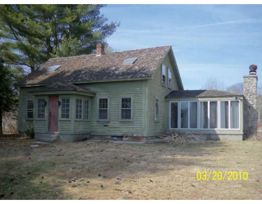 143 Lower Gore Road Webster, MA 01570 - Photo 1 of 1 a front view of a house with a garden