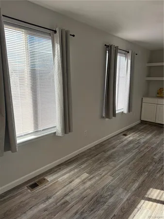 a view of a room that has a window