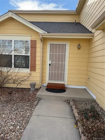 a front view of a house with a garage