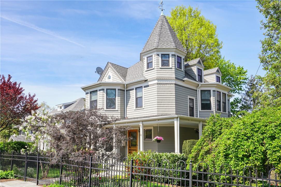 front view of a house with a garden