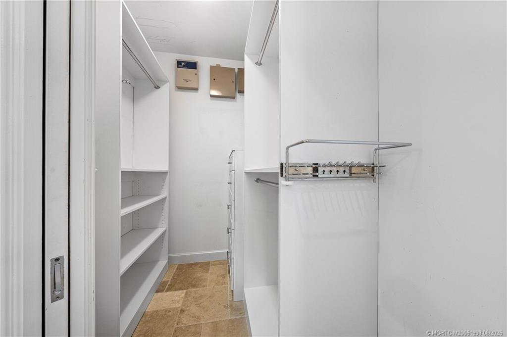7000 Southeast Lakeview Terrace Stuart, FL 34996 - Photo 23 of 56 a view of a hallway with storage