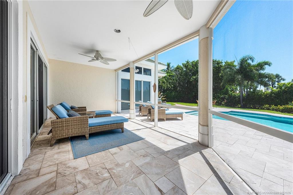 7000 Southeast Lakeview Terrace Stuart, FL 34996 - Photo 34 of 56 a building outdoor space with patio furniture and garden view