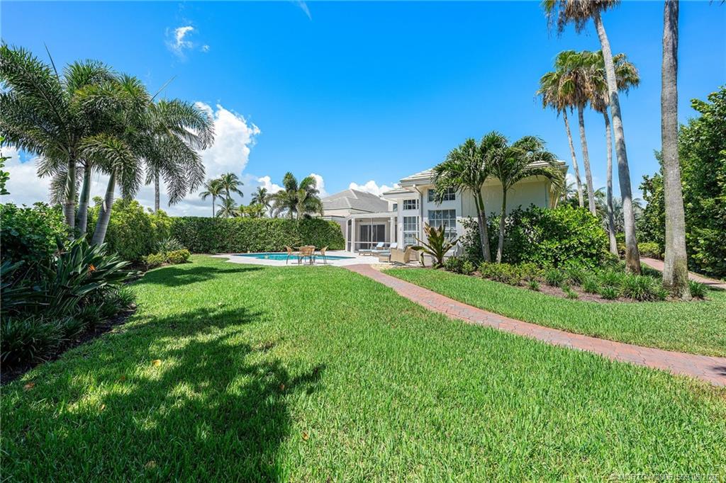 7000 Southeast Lakeview Terrace Stuart, FL 34996 - Photo 38 of 56 a view of a house with a yard