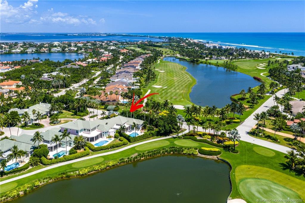 7000 Southeast Lakeview Terrace Stuart, FL 34996 - Photo 45 of 56 an aerial view of lake residential houses with outdoor space and swimming pool