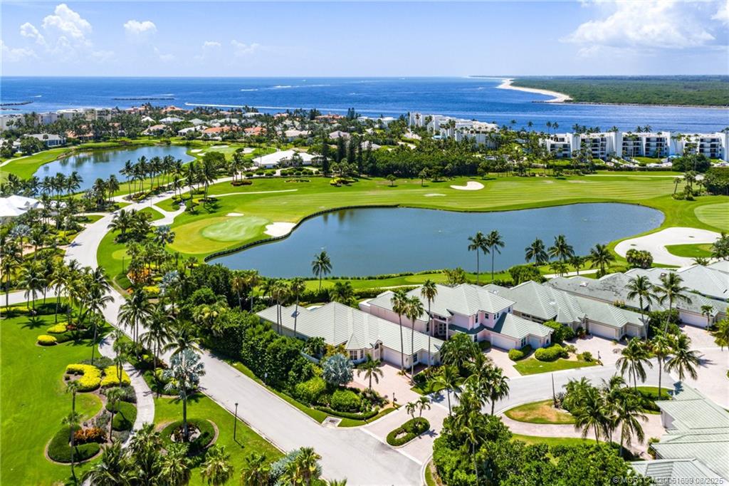 7000 Southeast Lakeview Terrace Stuart, FL 34996 - Photo 48 of 56 an aerial view of residential houses with outdoor space and swimming pool