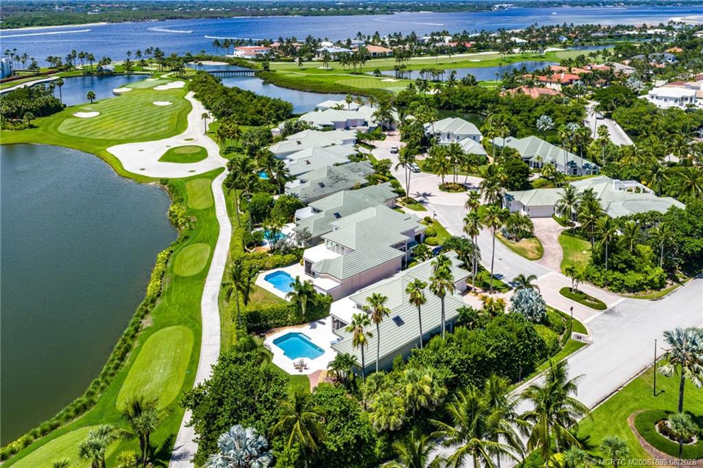 7000 Southeast Lakeview Terrace Stuart, FL 34996 - Photo 51 of 56 an aerial view of a swimming pool with outdoor seating