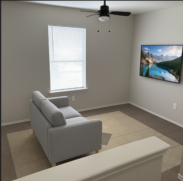 6622 Sutton Meadows Drive Houston, TX 77086 - Photo 19 of 45 a living room with furniture and a window