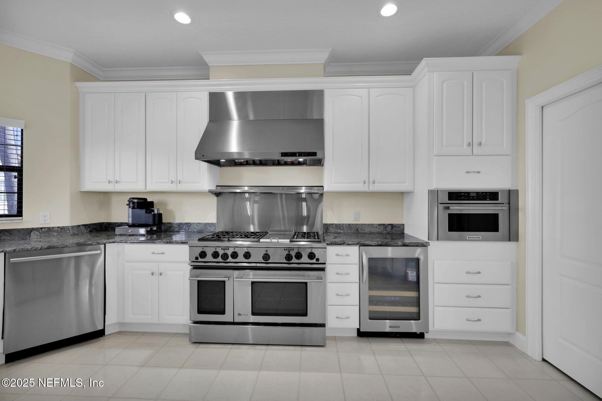 3713 Harbor Drive St. Augustine, FL 32084 - Photo 23 of 48 a kitchen with stainless steel appliances granite countertop a stove and a sink