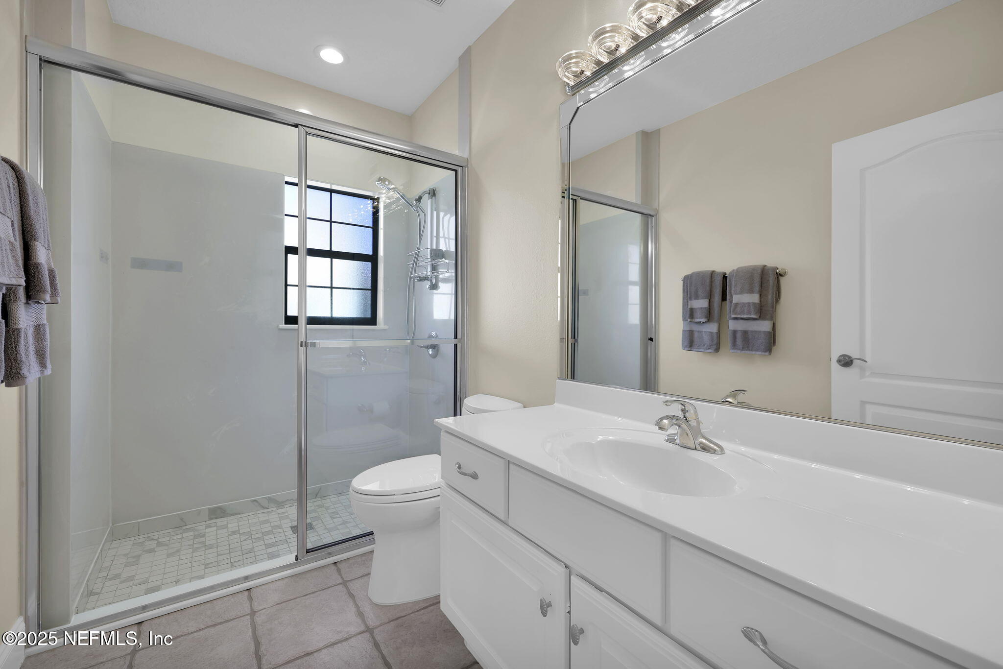 3713 Harbor Drive St. Augustine, FL 32084 - Photo 40 of 48 a bathroom with a sink toilet and shower